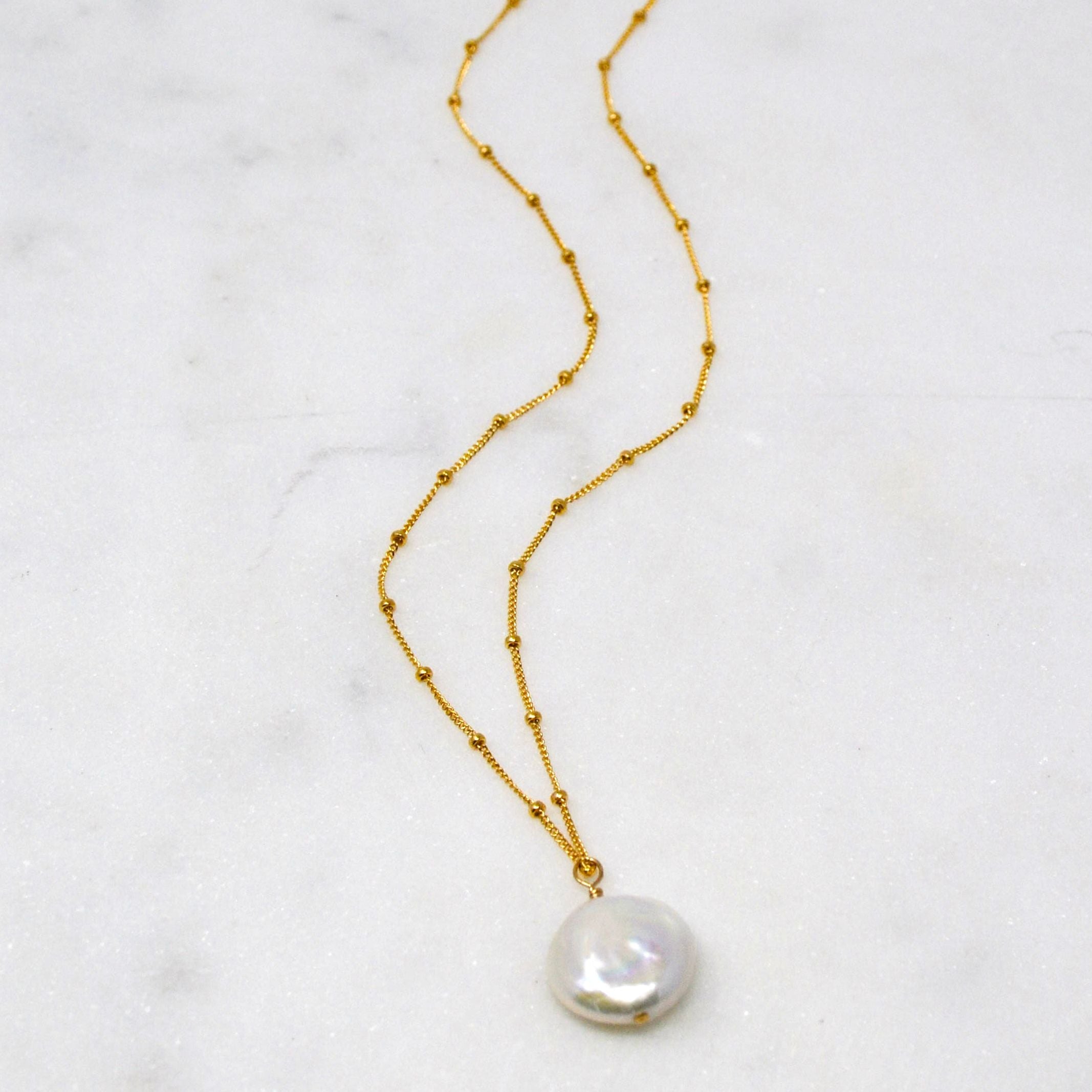 Gold Fill necklace with white coin pearl pendant.