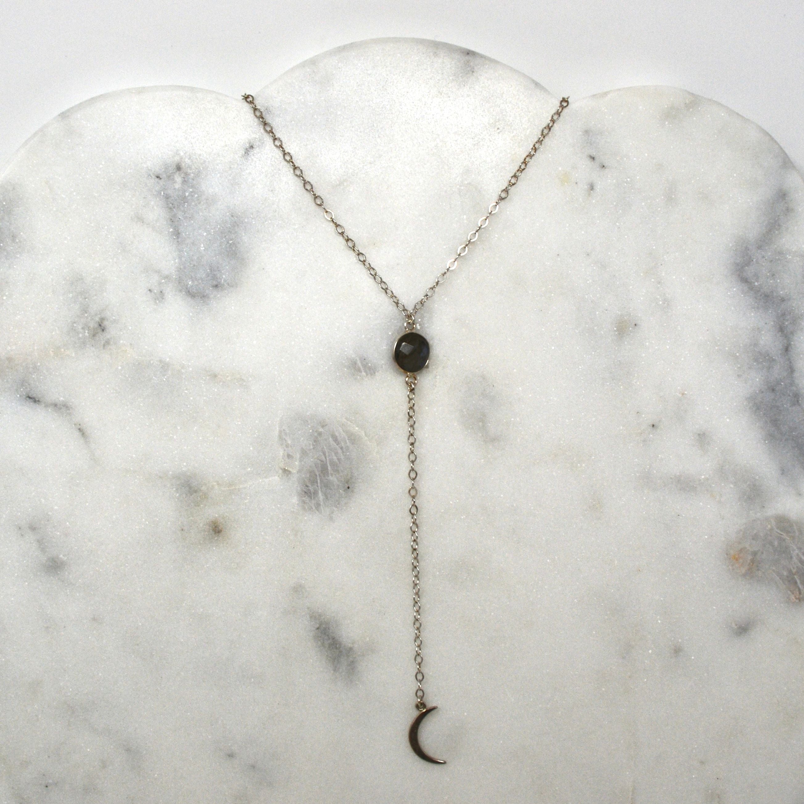 Beautiful labradorite faceted gemstone drop necklace with a present moon at the end of the drop chain in silver.