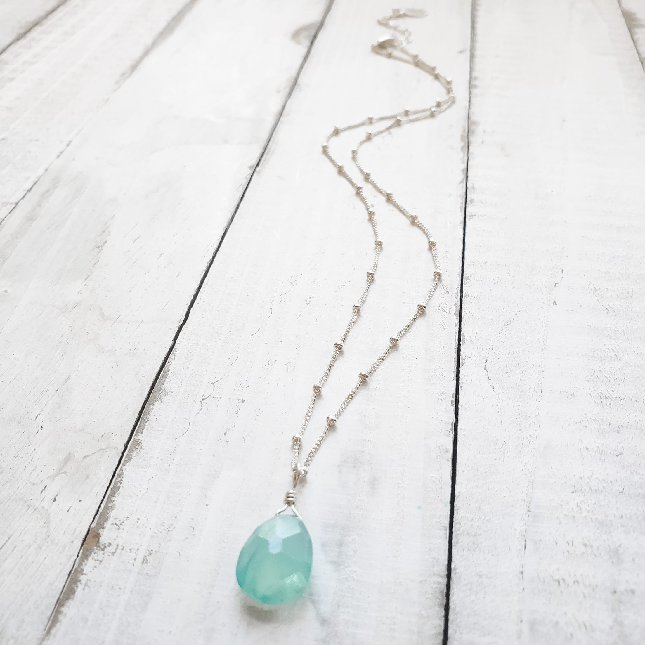sterling silver necklace with aqua chalcedony gemstone pendant.
