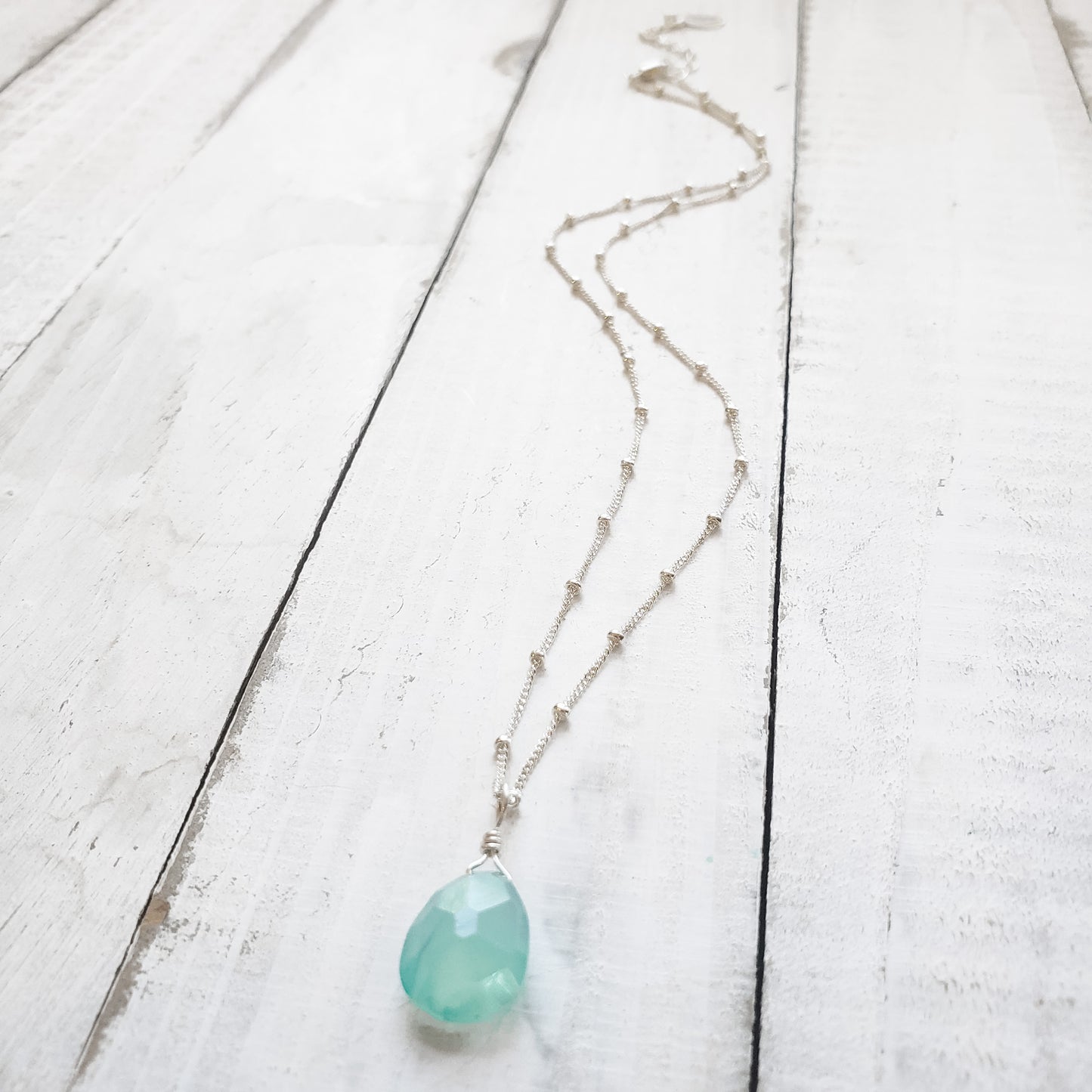 sterling silver necklace with aqua chalcedony gemstone pendant.